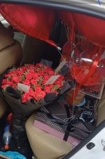 Book Car Full of gifts and Flowers - gifts in a car