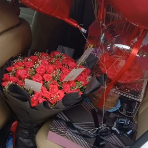 Book Car Full of gifts and Flowers - gifts in a car