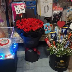 flowers and Chocolate delivery in a car