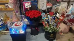 flowers and Chocolate delivery in a car